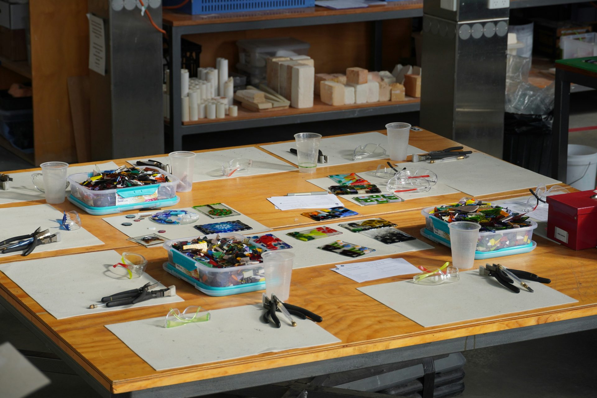 A wooden table topped with lots of legos